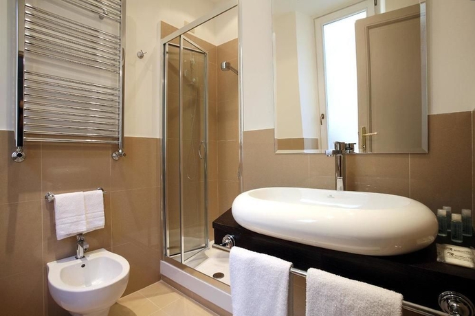 Imagen de la habitación del Aparthotel Trianon Borgo Pio. Foto 10