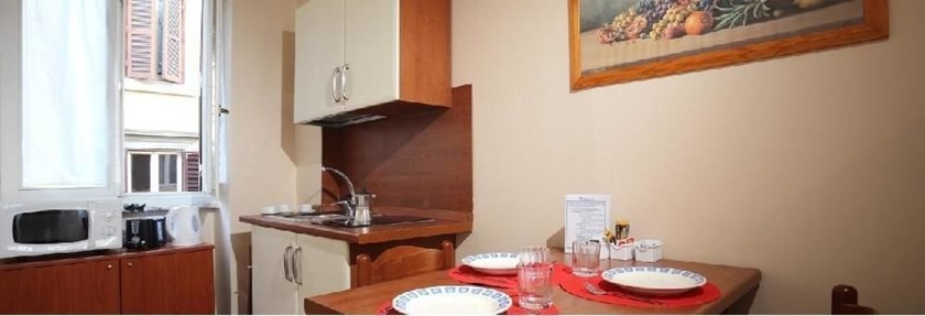Imagen de la habitación del Aparthotel Trianon Borgo Pio. Foto 13