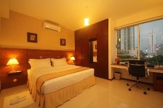 Imagen de la habitación del Aparthotel Unique Towers. Foto 8