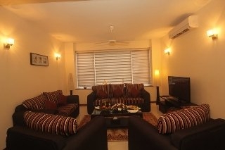 Imagen de la habitación del Aparthotel Unique Towers. Foto 9