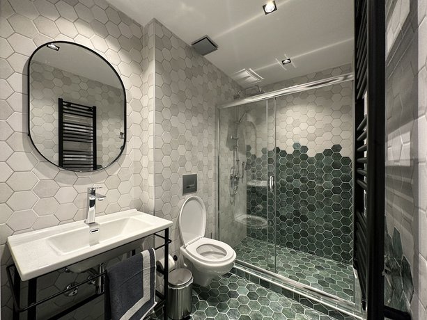 Imagen de la habitación del Aparthotel Urban Elephant Suites. Foto 3