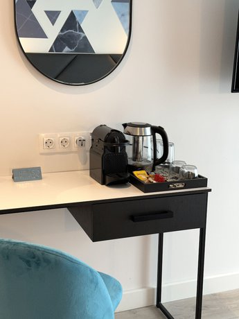 Imagen de la habitación del Aparthotel Urban Elephant Suites. Foto 11