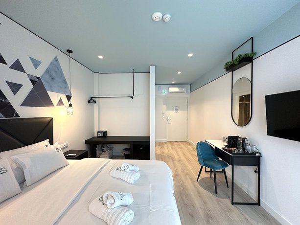 Imagen de la habitación del Aparthotel Urban Elephant Suites. Foto 13