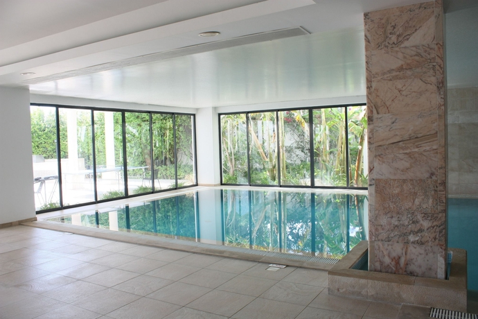 Imagen de la piscina del Aparthotel Vila Petra. Foto 7