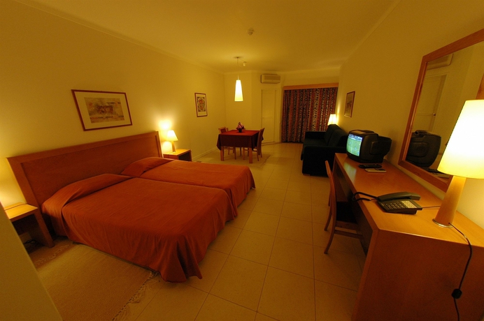 Imagen de la habitación del Aparthotel Vila Petra. Foto 4