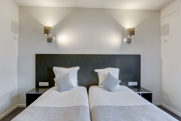 Imagen de la habitación del Aparthotel Villa Paris Orly. Foto 6
