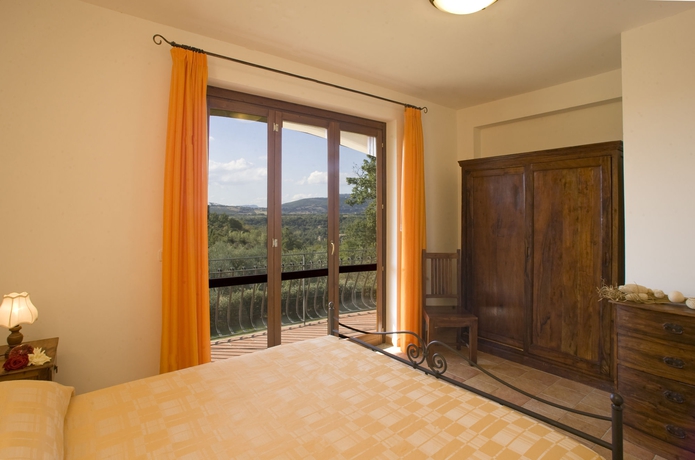 Imagen de la habitación del Aparthotel Villaggio Le Querce. Foto 2