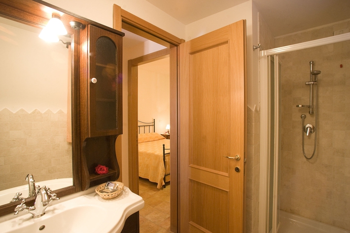 Imagen de la habitación del Aparthotel Villaggio Le Querce. Foto 3