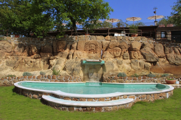 Imagen de la piscina del Aparthotel Villaggio Le Querce. Foto 5