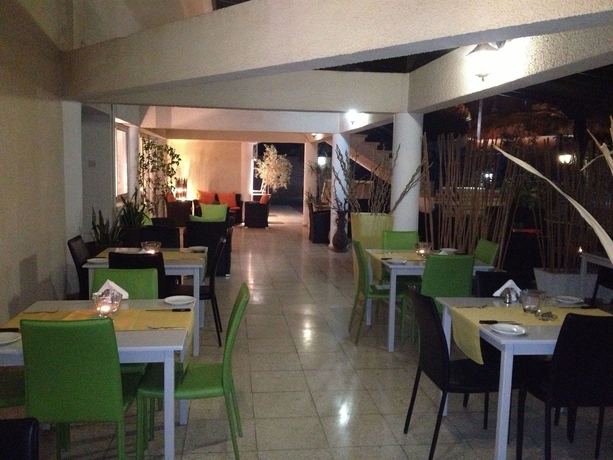 Imagen del bar/restaurante del Aparthotel Vrachia Beach Hotel and Suites - Adults Only. Foto 3
