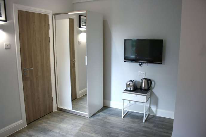 Imagen de la habitación del Aparthotel Westciti Caroco. Foto 7