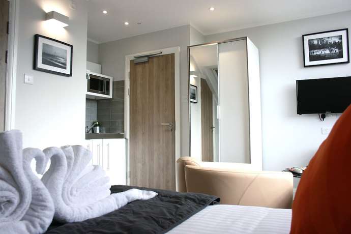 Imagen de la habitación del Aparthotel Westciti Caroco. Foto 14