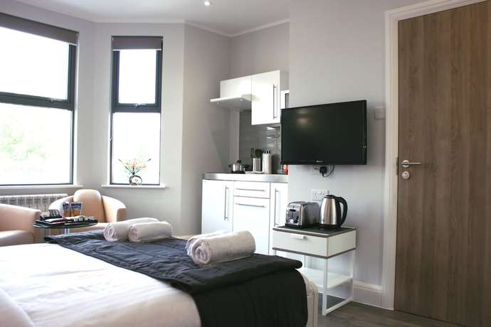 Imagen de la habitación del Aparthotel Westciti Caroco. Foto 18