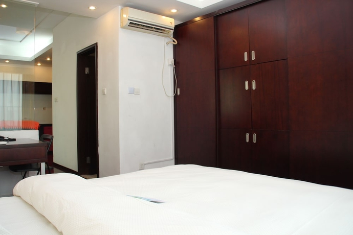 Imagen de la habitación del Aparthotel World Union Service Apartment Cosmo. Foto 4