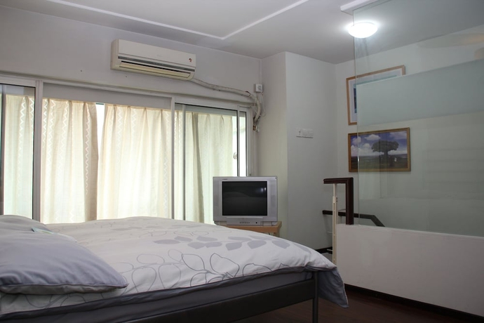 Imagen de la habitación del Aparthotel World Union Service Apartment Cosmo. Foto 8