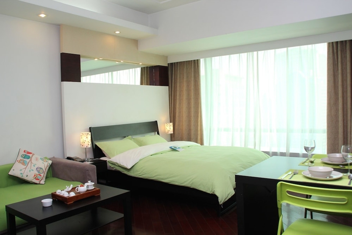 Imagen de la habitación del Aparthotel World Union Service Apartment Cosmo. Foto 9
