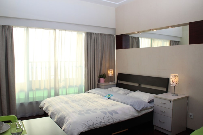 Imagen de la habitación del Aparthotel World Union Service Apartment Cosmo. Foto 12