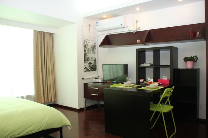 Imagen de la habitación del Aparthotel World Union Service Apartment Cosmo. Foto 15