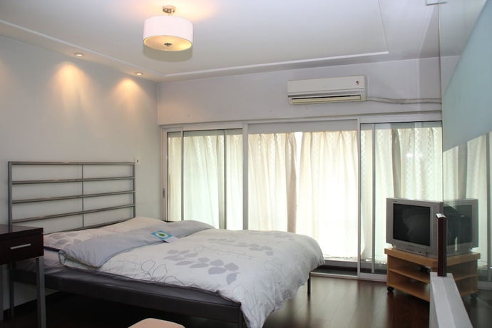 Imagen de la habitación del Aparthotel World Union Service Apartment Cosmo. Foto 16