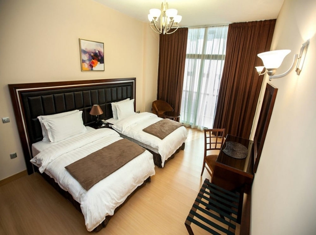 Imagen de la habitación del Aparthotel Xclusive Maples Hotel Apartment. Foto 5