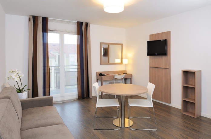 Imagen de la habitación del Aparthotel Zenitude H&ocirc;tel R&eacute;sidences Roissy Village. Foto 12