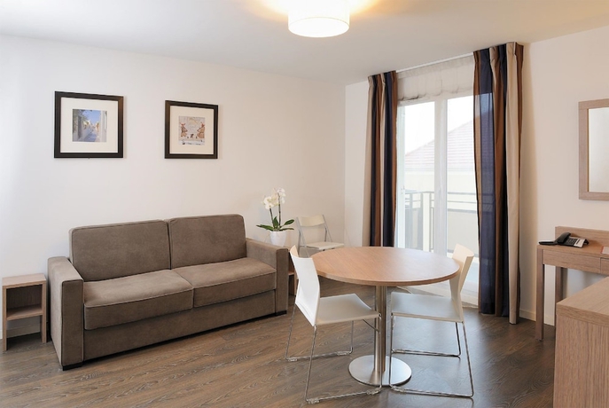 Imagen de la habitación del Aparthotel Zenitude H&ocirc;tel R&eacute;sidences Roissy Village. Foto 13