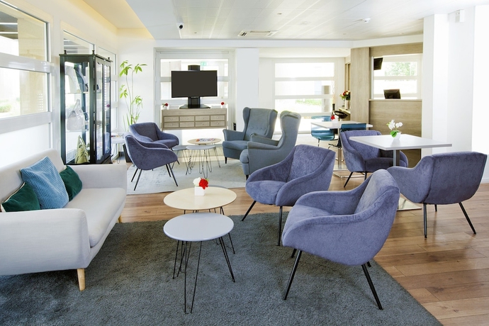 Imagen de los interiores del Aparthotel Zenitude H&ocirc;tel R&eacute;sidences Roissy Village. Foto 19