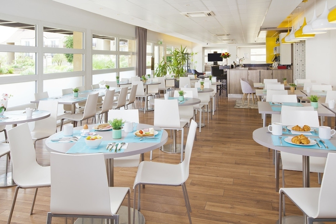Imagen del bar/restaurante del Aparthotel Zenitude H&ocirc;tel R&eacute;sidences Roissy Village. Foto 6