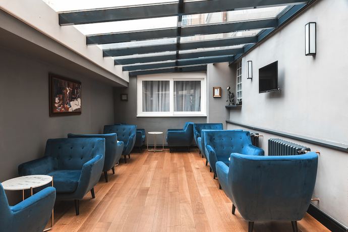 Imagen de los interiores del Aparthotel numa l Root Rooms & Apartments. Foto 16