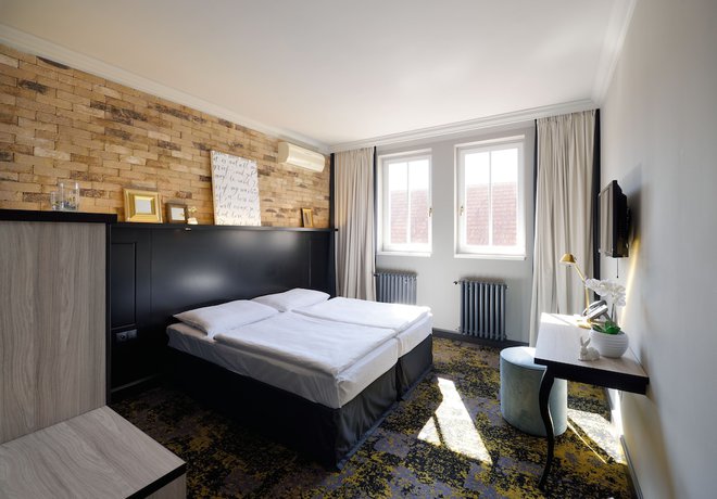 Imagen de la habitación del Aparthotel numa l Root Rooms & Apartments. Foto 4