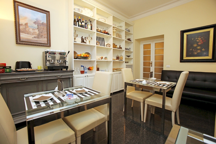 Imagen del bar/restaurante del B&B Amica Roma. Foto 3