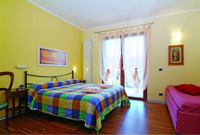 Imagen de la habitación del B&B Aurelia Garden Gold. Foto 4