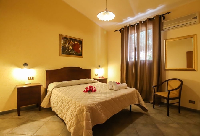 Imagen de la habitación del B&B Cala Dell'arena. Foto 13