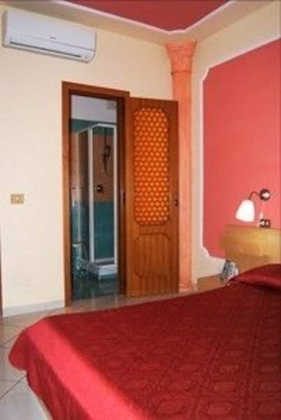 Imagen de la habitación del B&B Cave Canem Pompei. Foto 6