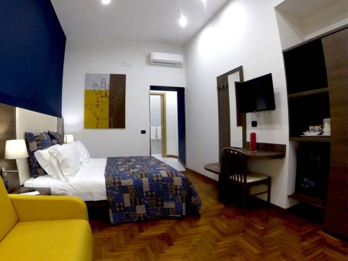 Imagen de la habitación del B&B Chiaia 32. Foto 14