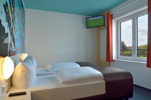Imagen de la habitación del B&B Hotel München City-ost. Foto 8