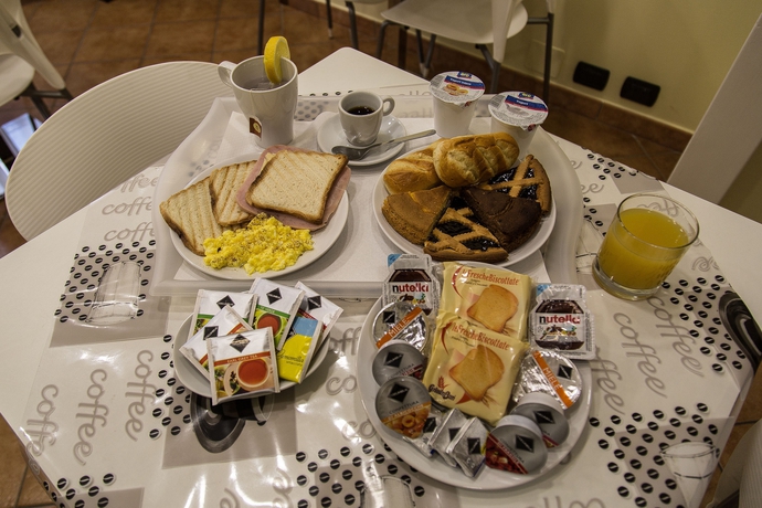 Imagen del bar/restaurante del B&B Il Corso Comfort Rooms. Foto 6