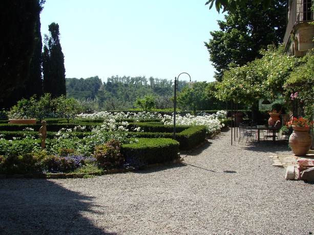 Imagen de los exteriores del B&B La Canonica di Cortine. Foto 7