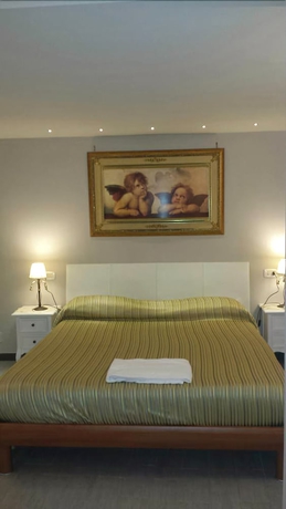 Imagen de la habitación del B&B La Dimora Di Nettuno. Foto 8