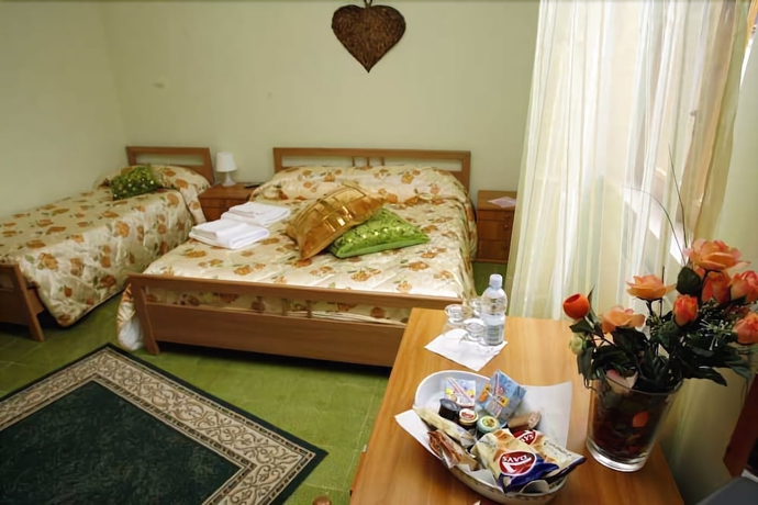 Imagen de la habitación del B&B Luana Inn Holiday. Foto 13