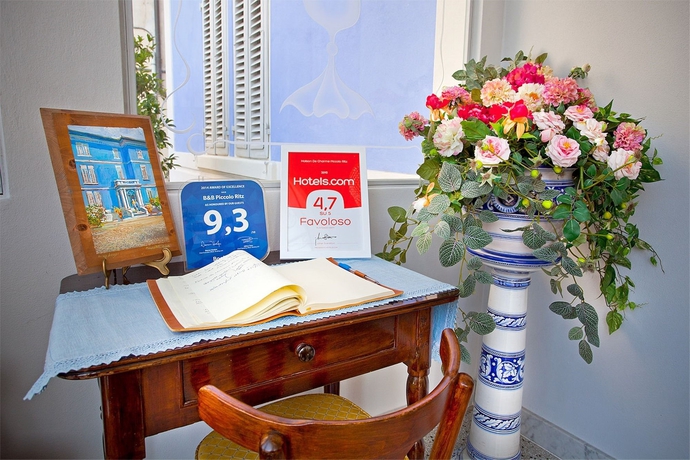 Imagen de los interiores del B&B Lucca In Azzurro Maison De Charme. Foto 14