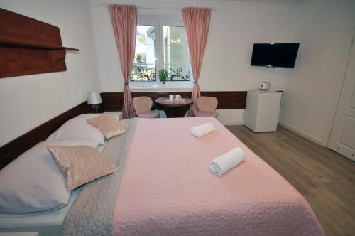 Imagen de la habitación del B&B Ośrodek Wczasowy Magnat. Foto 9