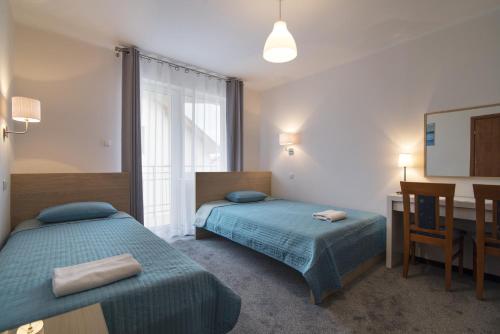 Imagen de la habitación del B&B Osrodek BURSZTYN. Foto 3