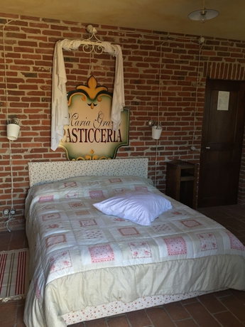 Imagen de la habitación del B&B Osteria Del Maiale Pezzato. Foto 4