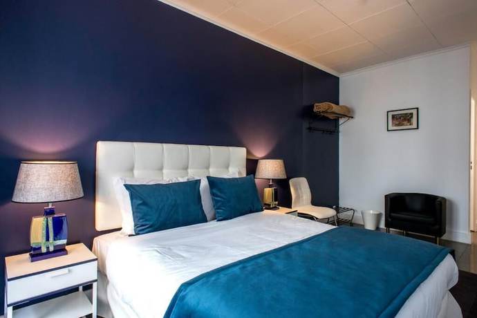 Imagen de la habitación del B&B Ph Downtown Suites. Foto 2