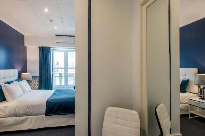 Imagen de la habitación del B&B Ph Downtown Suites. Foto 10