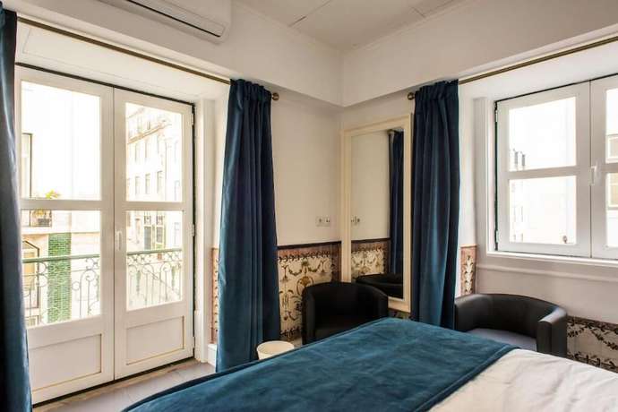 Imagen de la habitación del B&B Ph Downtown Suites. Foto 13