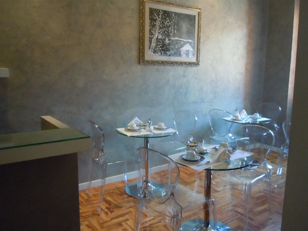 Imagen del bar/restaurante del B&B Relais Conte Di Cavour De Luxe. Foto 4