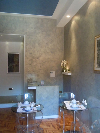 Imagen del bar/restaurante del B&B Relais Conte Di Cavour De Luxe. Foto 5