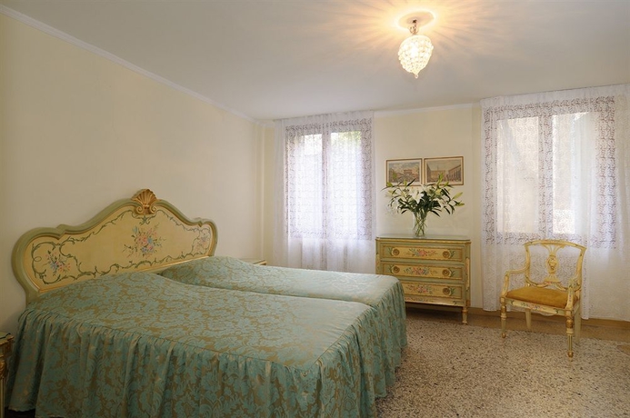 Imagen de la habitación del B&B Riva De Biasio. Foto 8